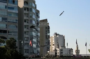 AP photographer captures moment bomb hits apartment building in Lebanon